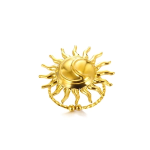 Gold stainless steel sun and moon ring with twisted texture band on white background