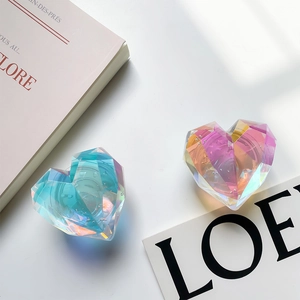 Macro shot of 3D faceted heart phone grips with vibrant iridescent sparkle finish
