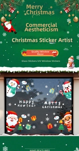 Detail of Christmas window clings featuring Santa, reindeer, and Happy New Year text