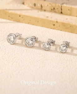 Detailed view of silver S925 sterling silver bubble stud earrings with VVS1 moissanite stones