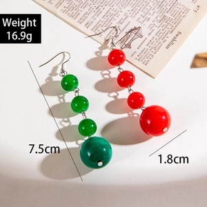 Detailed size specifications for red and green beaded Christmas earrings on vintage paper