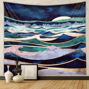Detailed view of an abstract tapestry featuring mountain, moon, and starry sky patterns
