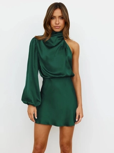 Detail of elegant dark green satin mini dress with one-shoulder long sleeve design