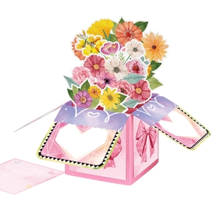 Detail of 3D pop-up card featuring colorful watercolor flowers and a small pink note card