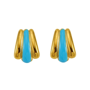 Macro detail of fan-shaped gold earrings with turquoise enamel inlay and vintage texture