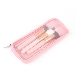 Pochette portapennelli rosa in rete traspirante con set di pennelli da trucco