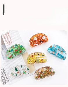 Detailed set of Christmas hair claws with reindeer, trees and sparkling sequins