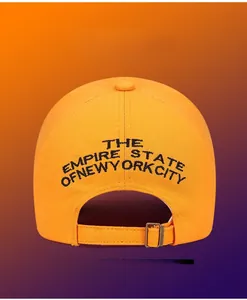 Close-up of NYC baseball cap back with metal buckle and black letter embroidery