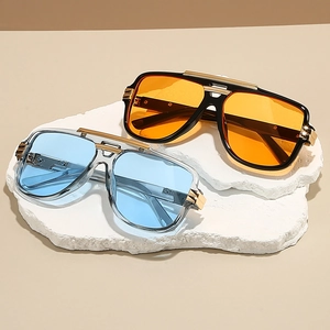 Retro square oversized sunglasses with gold metal accents and colorful tinted lenses