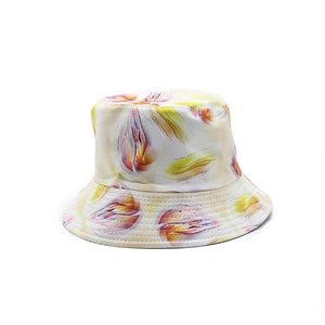 Close-up of multicolor floral bucket hat with tidy reinforced stitching on brim