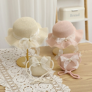 Kids straw sun hat and purse set with lace bows and pearl details for beach wear