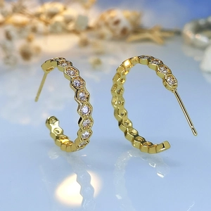 Elegant 18K gold-plated honeycomb C-shape earrings with sparkling cubic zirconia inlay