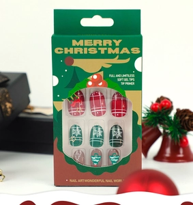Christmas soft gel nail tips featuring red plaid, green snowflake and brown tree patterns
