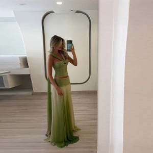 Sultry gradient green two-piece vacation set with ruched crop top and high-waist maxi skirt