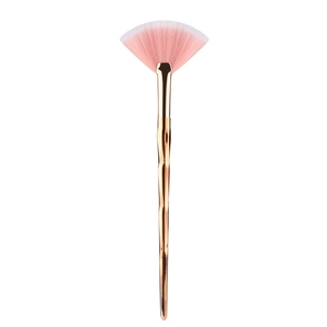 Detail of rose gold fan brush with soft pink gradient bristles and twisted metal handle