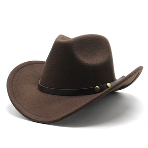 Detail of dark brown felt cowboy hat showing leather band and golden metal rivets