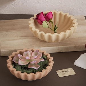 Detailweergave van siliconen mallen met golfstijl voor DIY gipsen potten en decoratie