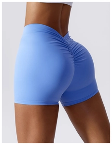 Close-up of sky blue high-waist yoga shorts with scrunch butt detail and elastic fabric