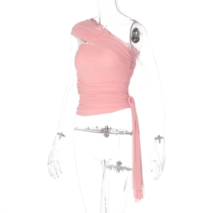Detail of pink mesh off-shoulder top featuring ruching and side ribbon ties