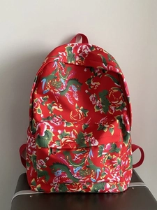 Traditional Chinese floral pattern backpack with vibrant red peony and dragon prints