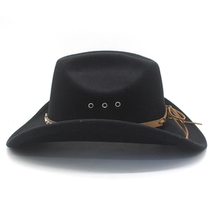 Detail of black western cowboy hat featuring metallic eyelets and brown leather band
