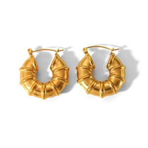 Pair of thick golden hoop earrings with hollow bamboo-inspired twisted metal design