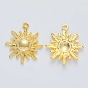 Pair of vintage golden sun pendants in alloy for DIY jewelry making and crafting