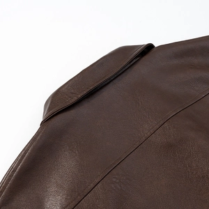 Brown distressed PU leather biker jacket for women with vintage washed texture detail