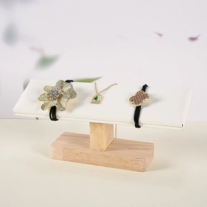 Minimalist rubber wood jewelry display stand with white t-bar for watches and bracelets
