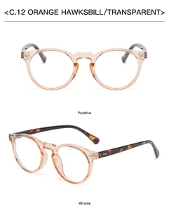 Detailed views of orange hawksbill and transparent round frames with rice nail accents