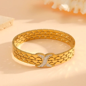 Bracelet doré en acier inoxydable en forme de X avec croissants et strass blancs