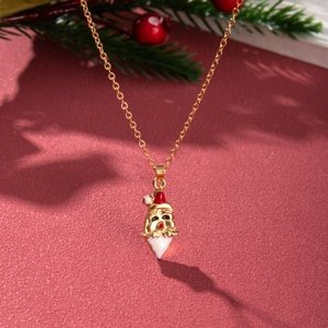 Macro view of Santa Claus pendant with colorful enamel on a golden festive necklace