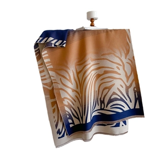 Elegant orange and navy blue tiger print cashmere blend scarf for women's winter fashion
