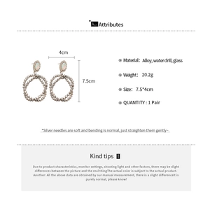 Tableau détaillé des tailles et matériaux pour boucles d'oreilles pendantes en cristal