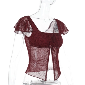 Detail of burgundy lace square neck top showing bow tie and intricate floral texture