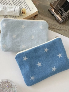 Denim star print makeup bags set in light and dark blue with secure zip closure