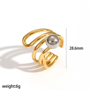 Detail view of gold and silver irregular geometric ring with size and weight metrics