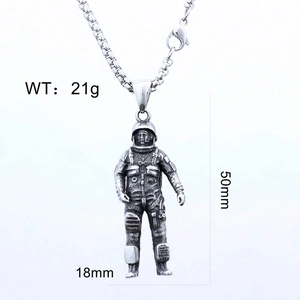 Macro detail showing vintage silver astronaut pendant dimensions 50mm height and 21g weight