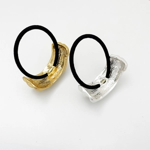 Chic U-shaped gold and silver metallic hair ties with black pleated elastic bands