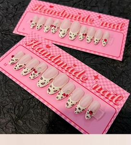 Handmade French leopard press-on nails with red heart rhinestones and oval shape