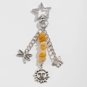 Detailed silver keychain featuring moon star turquoise tassels and metal butterfly charms