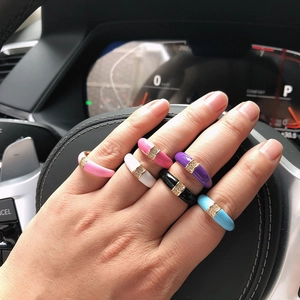 Chic gold-plated enamel rings with rhinestones for women, shown in six vibrant colors