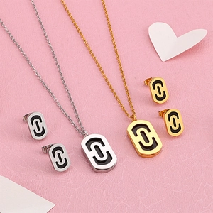 Fashion paperclip necklace and earring set with black enamel interlocking design