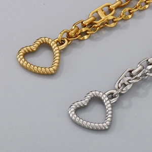 Detail of titanium steel double layer heart bracelet with twisted rope texture OT clasp