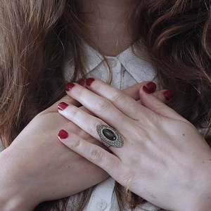 Bohemian vintage alloy ring with oval black gemstone in antique silver finish for women