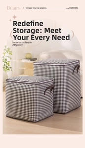 Detail view of houndstooth storage bags with durable side handles and smooth zipper closure