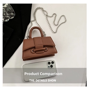 Detail view of brown lychee grain leather mini bag with silver bead chain strap