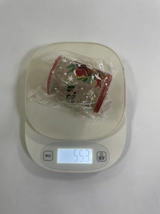 Nastro natalizio in tela di iuta da 55,3g su bilancia digitale per decorazioni DIY