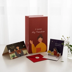 Teacher appreciation gift set including a red gift bag, greeting cards and envelopes