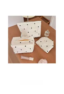 Lot de 3 trousses de toilette matelassées à pois comprenant un grand sac et pochettes